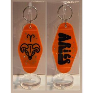 ARIES Zodiac Stars Retro Motel Orange Black Keychain